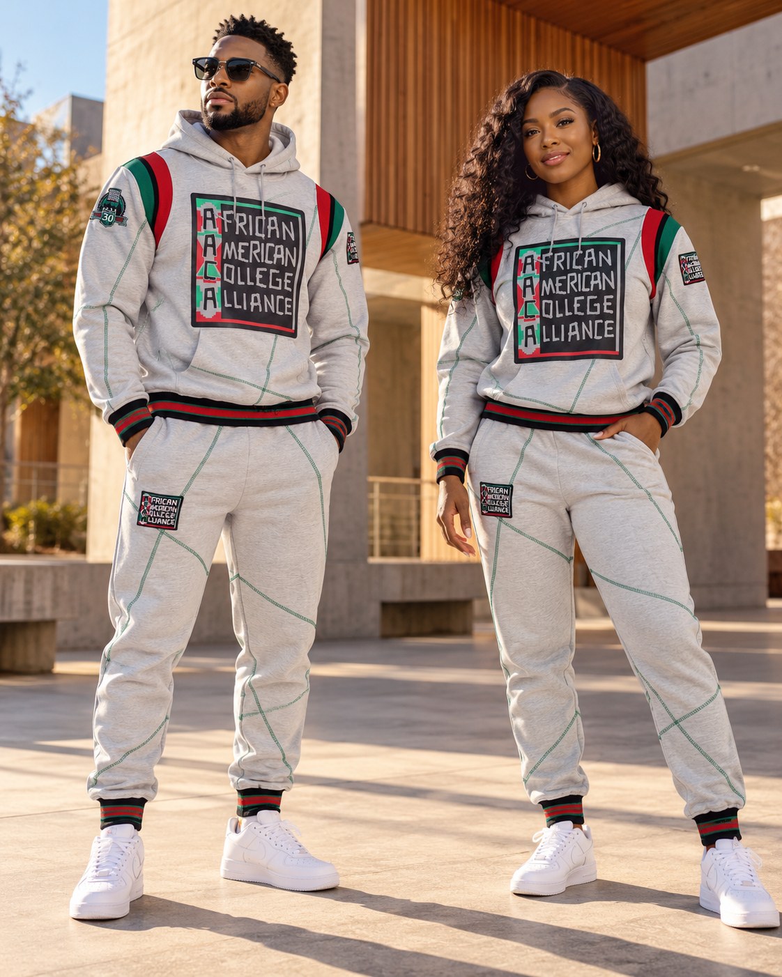 Male and female models wearing the matching AACA grey and green set