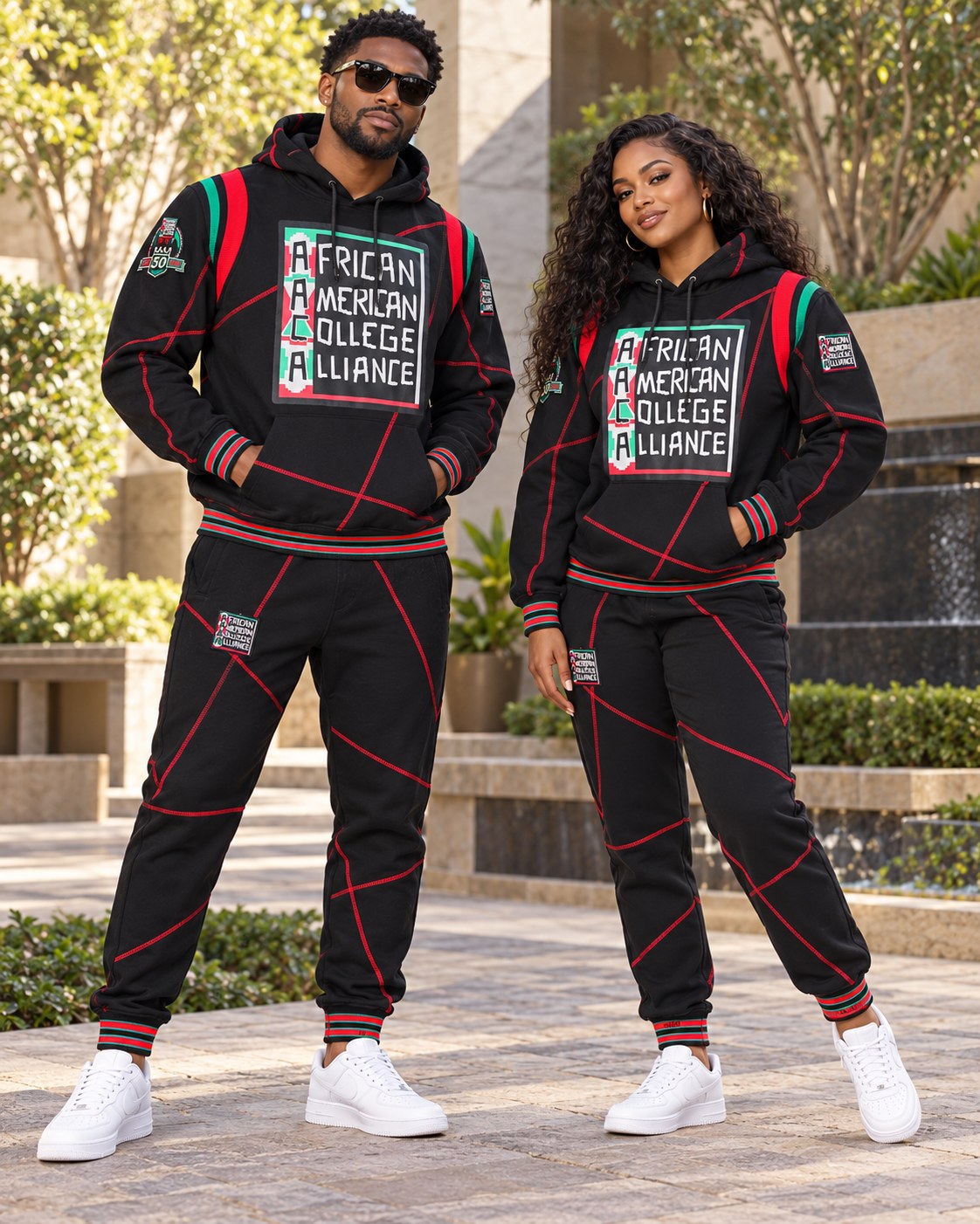 Male and female models wearing this matching AACA Logo hoodie and joggers